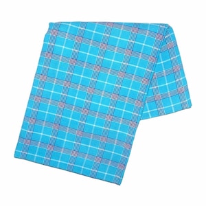 May include: A folded, rectangular textile in a vibrant turquoise hue, featuring a classic plaid pattern. The grid design incorporates thin white and burgundy lines, creating a visually appealing contrast. The fabric is neatly folded, showcasing the pattern's repeat.
