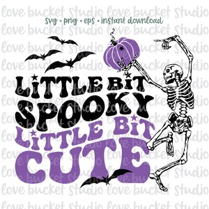 May include: A purple and black Halloween-themed graphic design with a skeleton holding a purple pumpkin. The text reads "Little Bit Spooky Little Bit Cute".