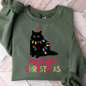 Meowy Christmas Sweatshirt, Cat Christmas Sweatshirt, Cat Lover Xmas T-Shirt, Black Cat Christmas, Cat Mom Gift, Cat Lover Gift For New Year