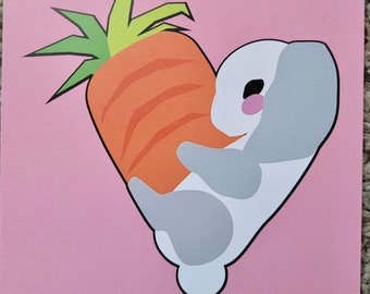 May include: A white rabbit with grey ears and a pink nose holds a large orange carrot with green leaves in its arms, forming a heart shape. The image is on a pink background.