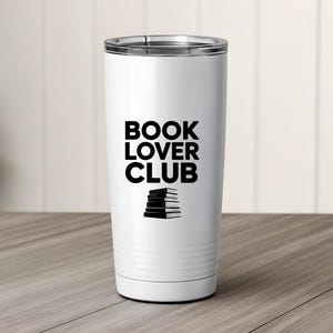 May include: A set of three ceramic mugs with a speckled, matte finish. The mugs are in shades of cream, light gray, and dark gray. Each mug has a simple, minimalist design, perfect for coffee or tea.