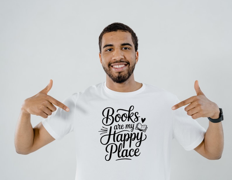 May include: A white ceramic mug with a black handle and the text "But First, Coffee" in a black, bold font. The mug is on a white surface.