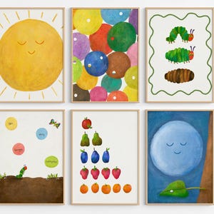 May include: A set of six framed wall art prints featuring illustrations of a yellow sun, colorful circles, a green caterpillar and brown cocoon, a caterpillar with text, various fruits, and a blue moon with a green leaf, all in light wood frames.
