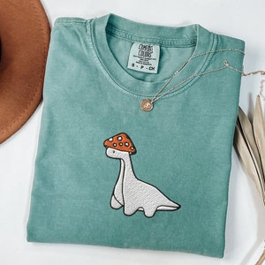 Embroidered Mushroom Dinosaur Comfort Colors Tshirt Dinosaur Shirt Paleontology Shirt Dino Shirt Velociraptor Shirt Trex Shirt Dinosaur Gift