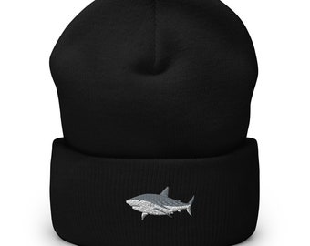 May include: Black beanie with a white embroidered shark on the front.