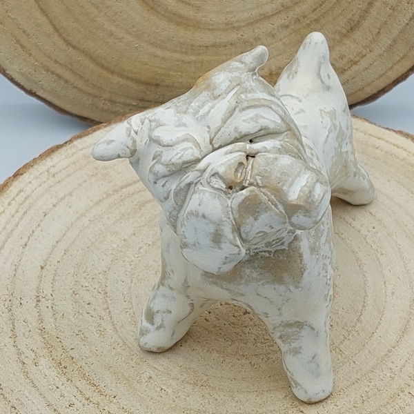 Small ceramic Bulldog figure with light colors