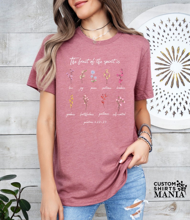 a woman wearing a t - shirt with the words, the heart of the matter
