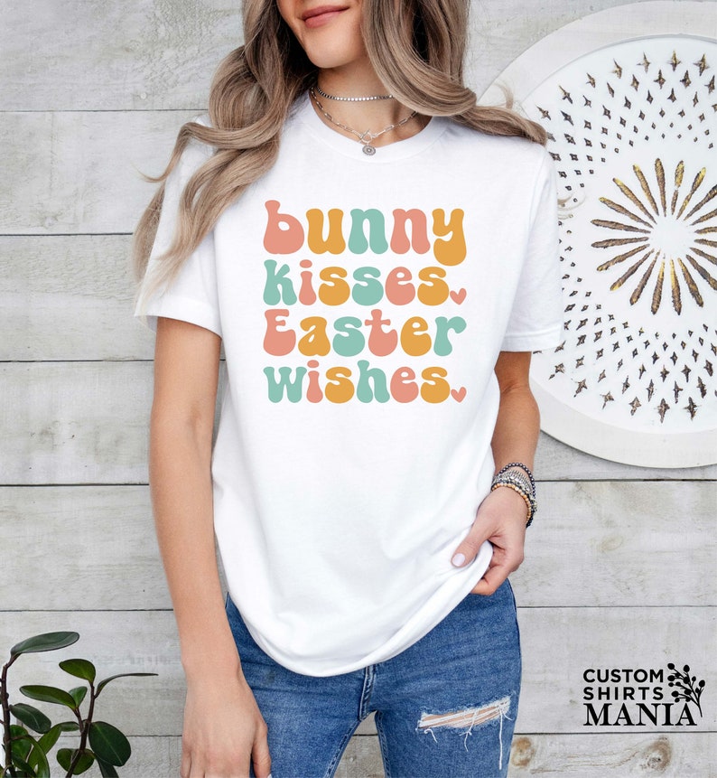 a woman wearing a t - shirt that says bunny kisses easter wishes
