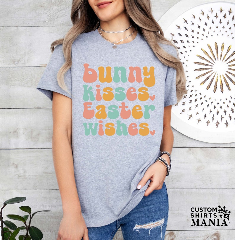 a woman wearing a t - shirt that says bunny kisses easter wishes