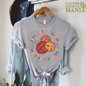 May include: Gray t-shirt with a colorful graphic of yarn balls and the text "I don't have a problem I have a yarn stash".