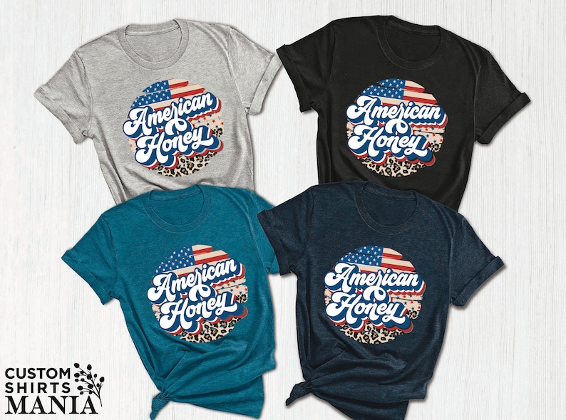 three american eagle t - shirts on a white background