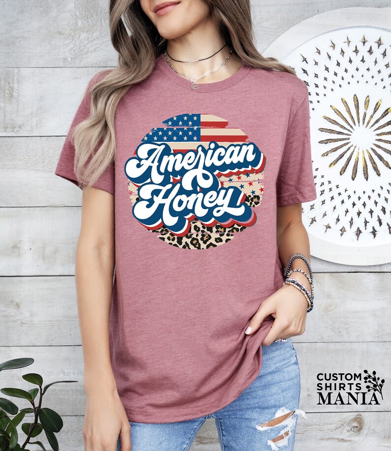 a woman wearing an american honey t - shirt