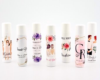 May include: Six white lip balm tubes with personalized labels featuring floral designs, wedding-related text, and illustrations of couples. The labels include text such as "Celebrate Love", "Will You Be Bridesmaid", and "To the Newly Weds".