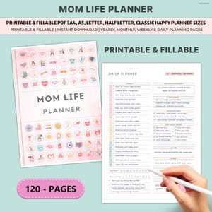 May include: A printable and fillable Mom Life Planner with 120 pages. The planner includes yearly, monthly, weekly, and daily planning pages. The cover features the text "MOM LIFE PLANNER" and decorative icons. A hand is holding a pen over a daily planner page.