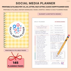 May include: A social media planner with a yellow gingham cover and a spiral binding. The cover features a circular design with social media icons. The planner includes daily, weekly, and monthly planning pages. A pink tag reads "145 Planning Pages".
