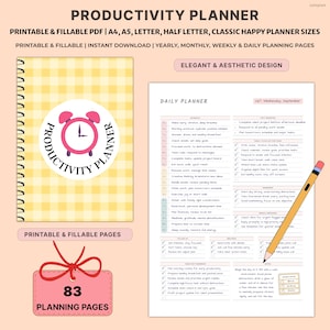 May include: A productivity planner with a yellow gingham cover and a pink alarm clock logo. The planner includes printable and fillable pages, with 83 planning pages. The design is elegant and aesthetic, with daily planning pages.