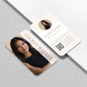 May include: Two business cards with rounded corners. One card features a photo of a woman and the name "CECILIA WALKER" in a gold color. The other card has the same name, contact information, and a QR code. The cards are cream-colored.
