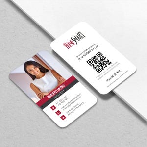 May include: Two white business cards with rounded corners. One card features a photo of a woman, the name "KIMBERLY MOORE REALTOR", and contact information. The other card displays the "HOME SMART" logo, a QR code, and website information.