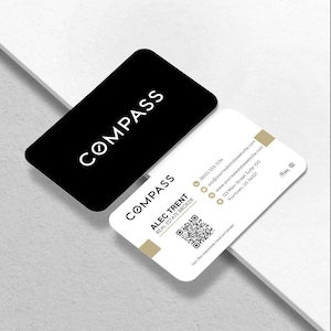 May include: Two business cards with rounded corners. One card is black with the word "COMPASS" in white. The other card is white with gold accents and the name "ALEC TRENT, REAL ESTATE BROKER" and contact information.