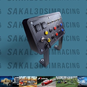 May include: A black control panel with multiple buttons, switches, and keys. The panel has a carbon fiber texture and is mounted on a black bracket. The text "SAKAL3DSIMRACING" is visible in the background. The panel includes buttons in yellow, red, and blue.