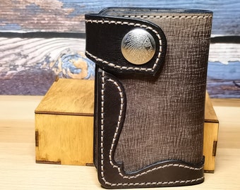 Average biker wallet made of genuine leather. A gift for him. A gift for the holiday. A present.