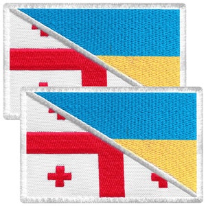 May include: Two embroidered patches featuring a split design. One side displays the flag of Georgia, with a white background and a red cross. The other side shows the flag of Ukraine, with blue and yellow sections. Both patches have a white border.