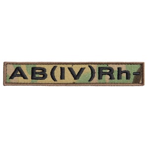 May include: Rectangular patch with a camouflage pattern and the black text "AB(IV)Rh-". The patch has a brown border, possibly for military or tactical applications.