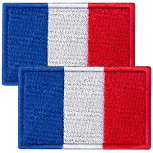 May include: Two rectangular embroidered patches featuring the French flag design. Each patch displays three vertical stripes in blue, white, and red with a matching stitched border. The embroidery texture is visible across the surface.