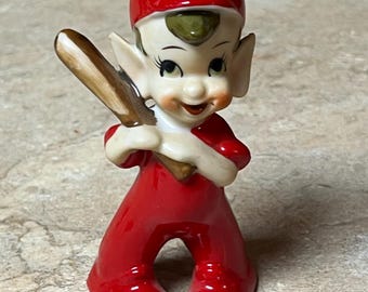 Pixie Elf Figurine in Red Baseball Suit holding a bat
