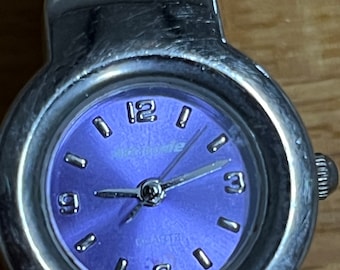 Reloj de pulsera de cuartos de galón