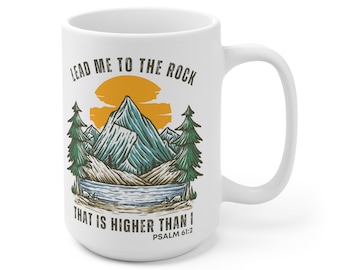 May include: White ceramic mug with a mountain scene and the text "Lead me to the rock that is higher than I" Psalm 61:2.