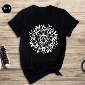 May include: Black t-shirt with a white design of a circle with science lab equipment and the text "Lab Tech" in the center.