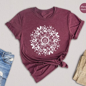 May include: A maroon heather t-shirt with a white design of a circle with science-related icons and the text "Lab Tech" in the center.