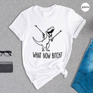 a t - shirt that says, what now is she?