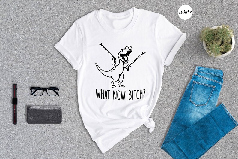 a t - shirt that says, what now is she?