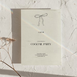 May include: A minimalist invitation card with a simple line drawing of a bow at the top. The text reads "You are invited to a Cocktail Party hosted by Rachel 5 o'clock in the afternoon Seattle, WA."