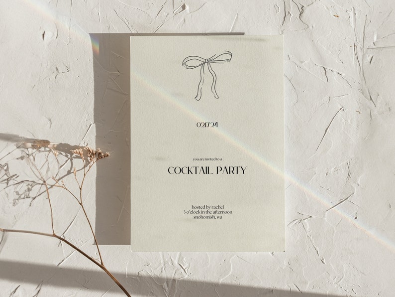 May include: A minimalist invitation card with a simple line drawing of a bow at the top. The text reads "You are invited to a Cocktail Party hosted by Rachel 5 o'clock in the afternoon Seattle, WA."