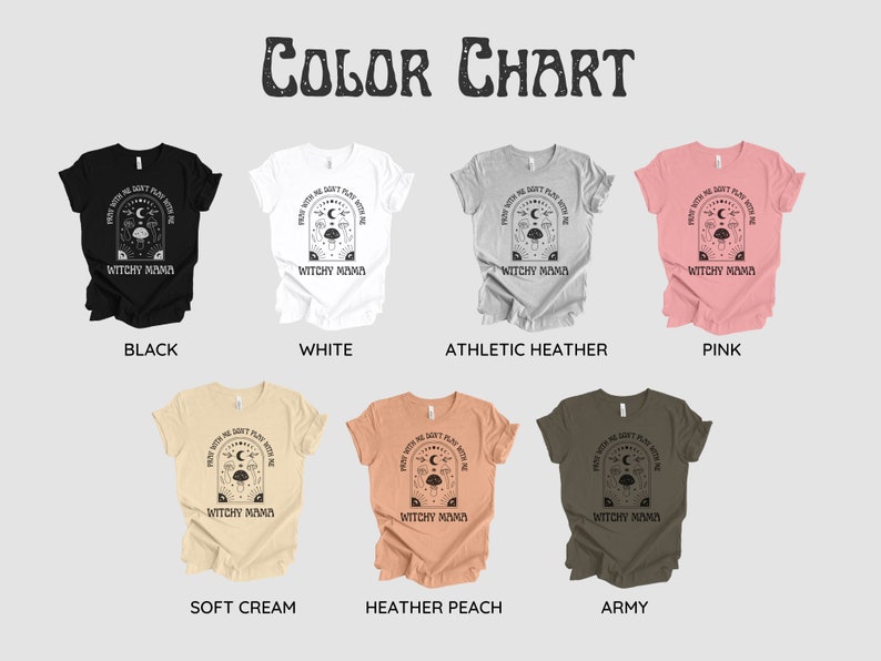 May include: Color chart showing different t-shirt colors available for purchase. The t-shirt design features a black and white illustration of a crescent moon, stars, mushrooms, and the text "Frew with me, we don't play with me, we're witchy mama".