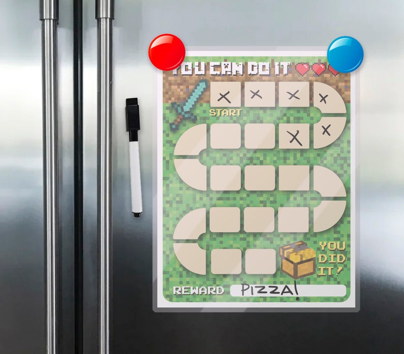 May include: A printable dry-erase board game with a Minecraft theme. The game board features a green background with a winding path and a chest at the end. The board has the text "You Can Do It!" at the top and "Reward Pizza!" at the bottom.
