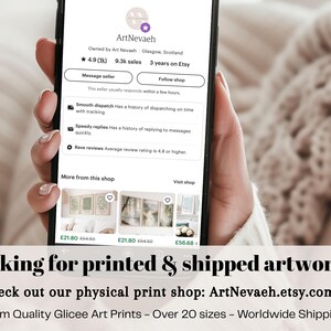 A person's hand holding a smartphone displaying a webpage for an online art marketplace called ArtNevahe. The webpage shows various artworks for sale, including prints and shipped artwork.