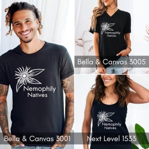 May include: Three different black t-shirts with a white graphic design of a flower and the text "Nemophily Natives". The t-shirts are shown on models. The text "Bella & Canvas 3001", "Bella & Canvas 3005", and "Next Level 1533" is shown below each t-shirt.