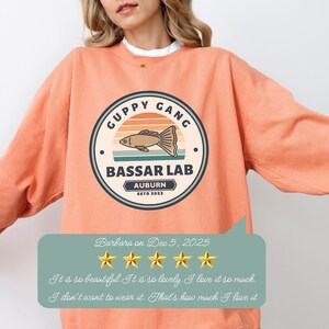 Terracotta Comfort Colors sweatshirt with custom logo – front view of branded merch crewneck in peachy hues.