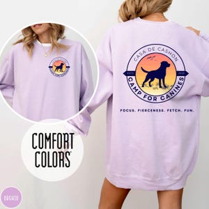Orchid Comfort Colors sweatshirt with custom logo – front and back view of branded merch crewneck in a pastel orchid-purple color.