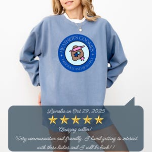 Blue Jean Comfort Colors sweatshirt with custom logo – front view of branded merch crewneck in light blue jean color.