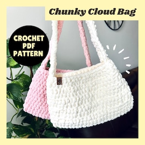 May include: Two handmade crochet bags, one white and one pink, with thick, textured yarn. The bags have long straps and are labeled "Chunky Cloud Bag" and "CROCHET PDF PATTERN". The bags are displayed against a neutral background with greenery.