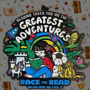 May include: A black metal medal with a colorful rainbow, a girl reading a book, a unicorn, a castle, a dragon, a soccer ball, and an Egyptian sphinx. The text on the medal reads "Reading takes you on the greatest adventures" and "Race to Read" with the distances "1M-5K-10K-13.1-26.2".