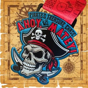 May include: A pirate-themed medal with the text "Pirates Treasure Chase" and "Ahoy Matey!" features a skull wearing a pirate hat and holding crossed swords. The medal is blue, black, red, and white, with a red ribbon.