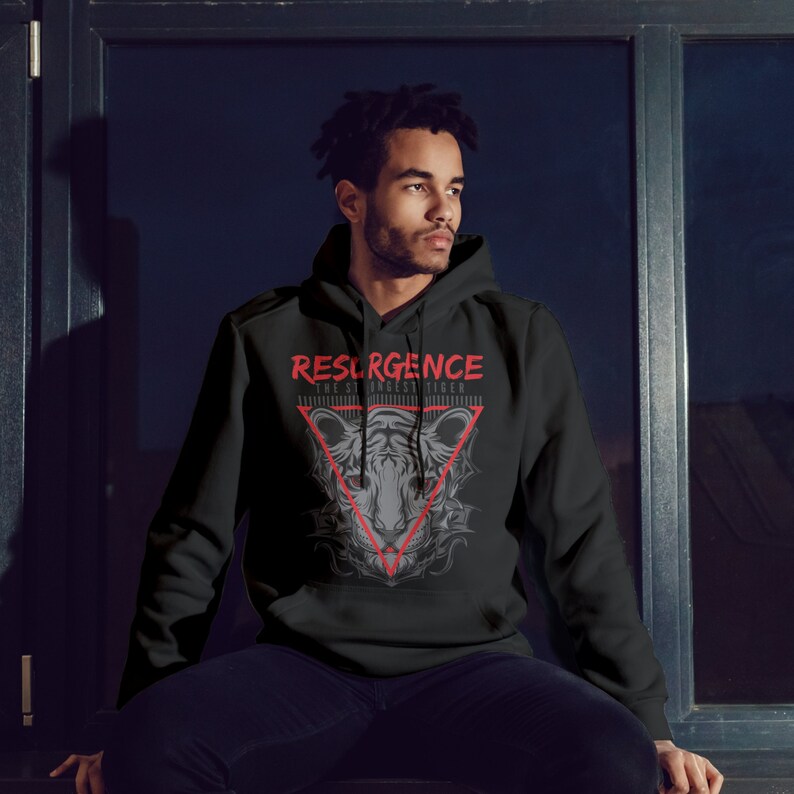 May include: Black hooded sweatshirt with a graphic print of a tiger's face in a triangle with the text "RESURGENCE THE STRONGEST TIGER" in red.