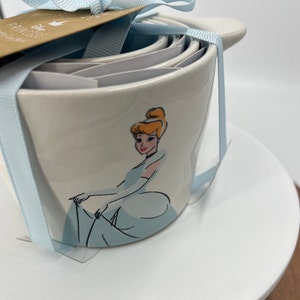 Cinderella Measuring Cups (4 Sizes) - Rae Dunn (Images include: Castle, Shoe, Pumpkin, Cinderella)
