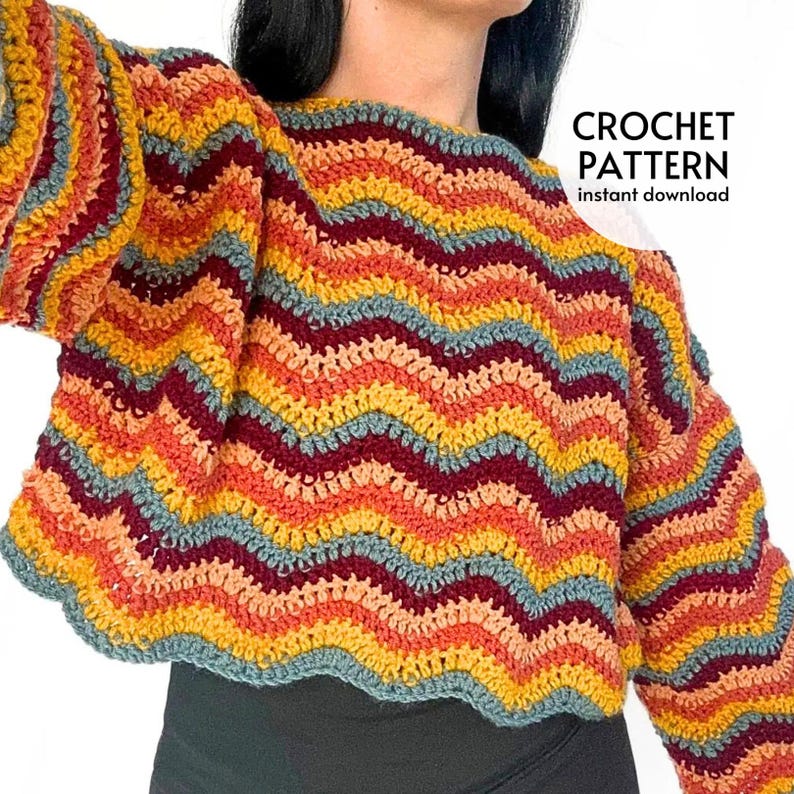 May include: A long-sleeve crochet sweater featuring a horizontal chevron wave pattern in alternating stripes of mustard yellow, deep burgundy, bright orange, and muted blue. The text CROCHET PATTERN instant download is visible in the upper right corner.
